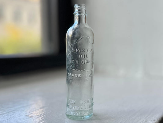 This unique amber glass bottle is a piece of American kitchen history. Originally containing Certo, a brand of fruit pectin used for jams and jellies, this bottle embodies the resourcefulness and charm of a bygone era.
