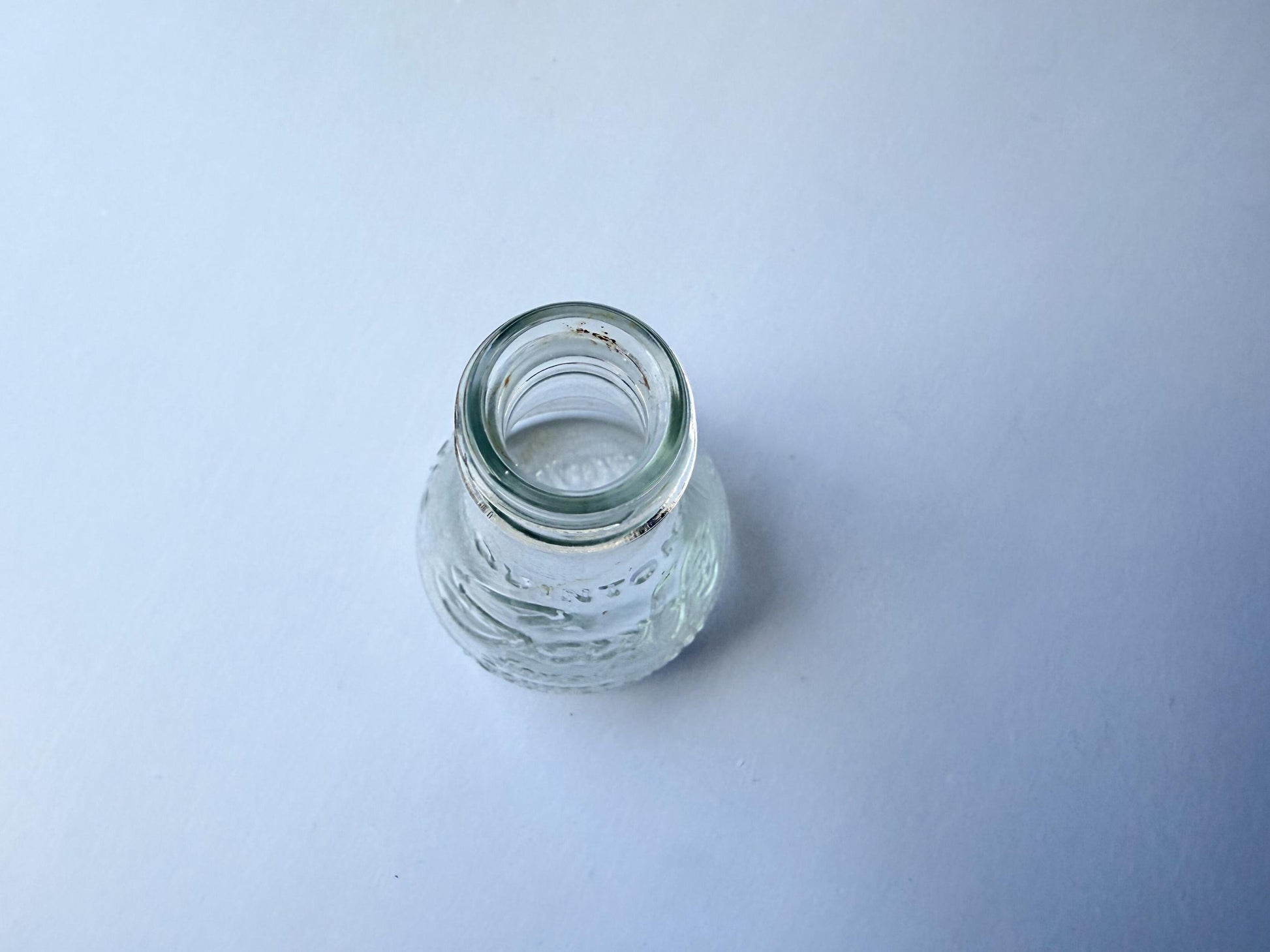 Vintage 1940s-1960s Quintone Scuffy shoe polish bottle with embossed lettering from KJ Quinn and Co Inc Malden Massachusetts. Perfect for vintage product collectors, bathroom displays, and cottagecore decor.