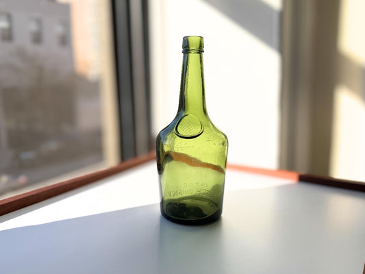 Vintage VAT69 Scotch whisky bottle with embossed lettering and Federal Law marking. Perfect for whisky collectors and Scottish spirits enthusiasts – Brooklyn Sea Glass