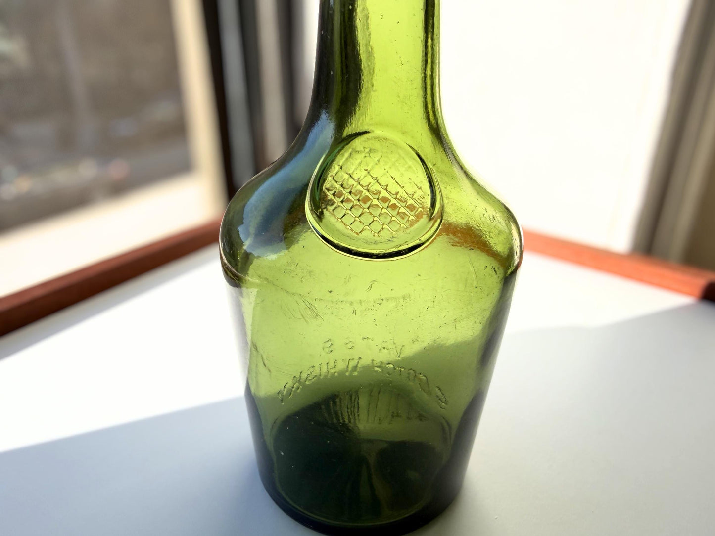 Vintage VAT69 Scotch whisky bottle with embossed lettering and Federal Law marking. Perfect for whisky collectors and Scottish spirits enthusiasts – Brooklyn Sea Glass