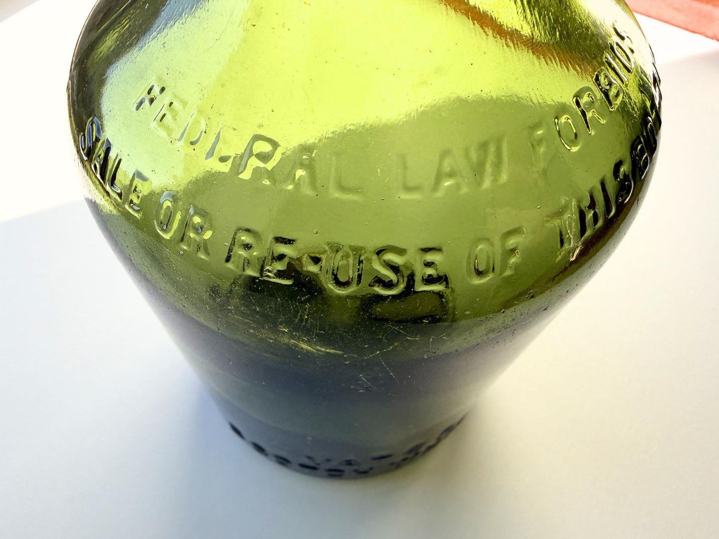 Vintage VAT69 Scotch whisky bottle with embossed lettering and Federal Law marking. Perfect for whisky collectors and Scottish spirits enthusiasts – Brooklyn Sea Glass