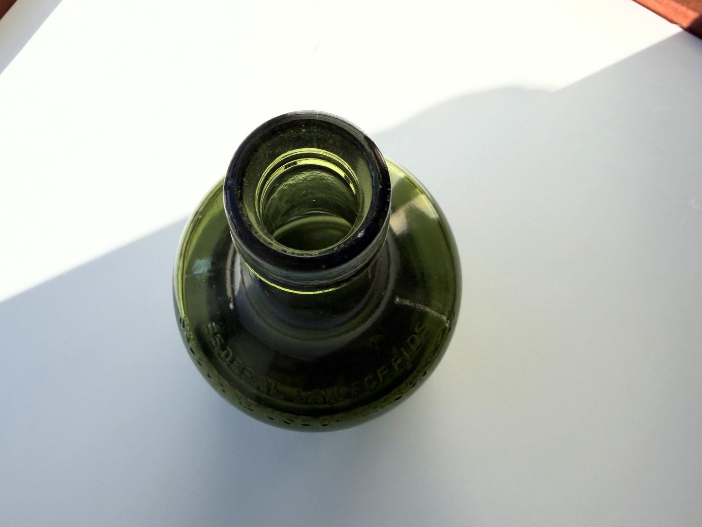 Vintage VAT69 Scotch whisky bottle with embossed lettering and Federal Law marking. Perfect for whisky collectors and Scottish spirits enthusiasts – Brooklyn Sea Glass