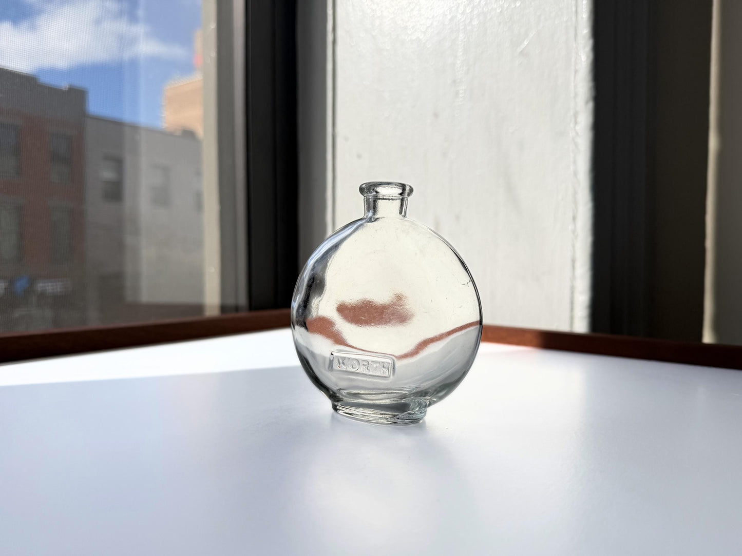 Vintage House of Worth clear crystal globe perfume bottle 4 inches tall with WORTH embossed cartouche - French haute couture heritage piece hand-recovered from NYC