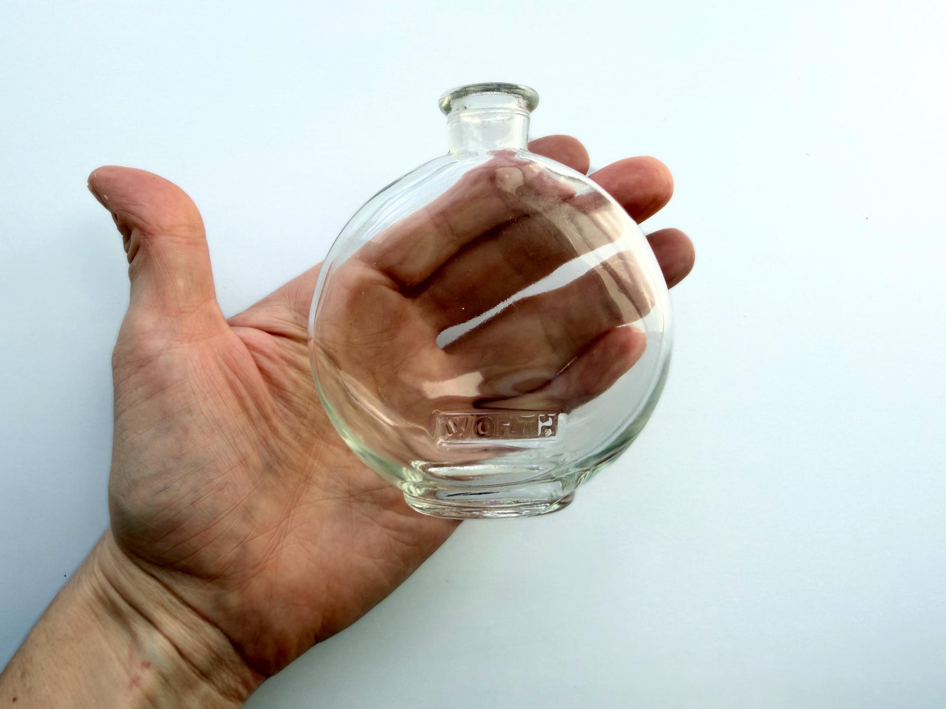 Vintage House of Worth clear crystal globe perfume bottle 4 inches tall with WORTH embossed cartouche - French haute couture heritage piece hand-recovered from NYC