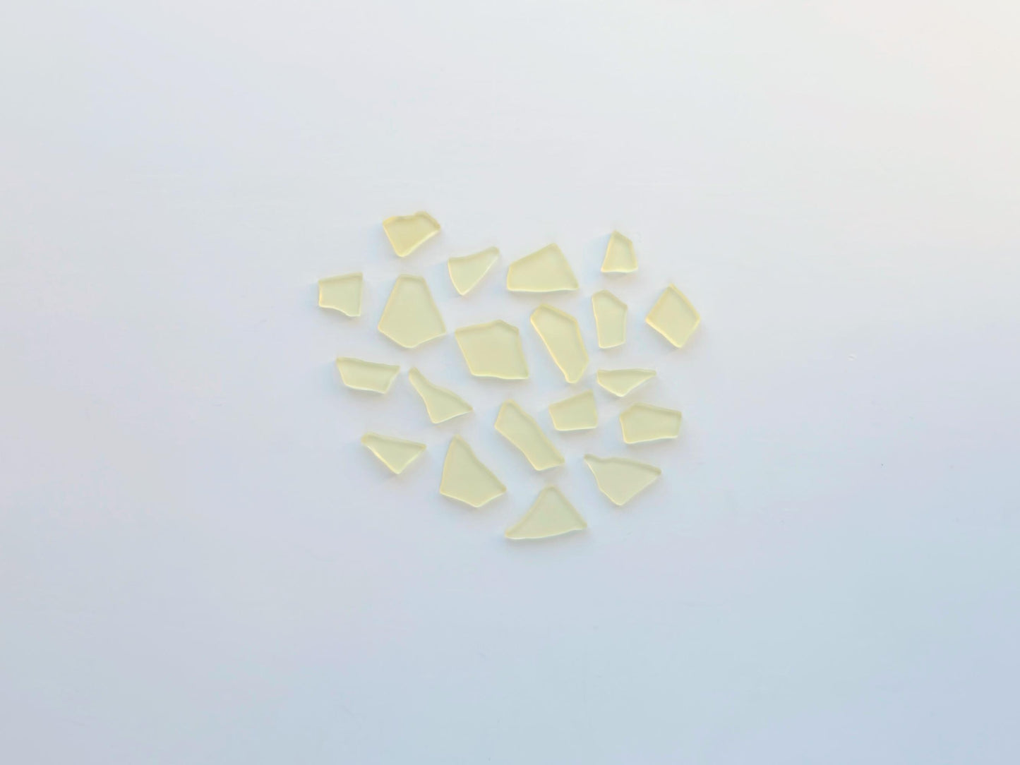 Buttercream yellow tumbled sea glass pieces with smooth frosted edges in small to medium sizes perfect for spring jewelry making mosaics resin art wedding decor and coastal home accents made from recycled vintage glass