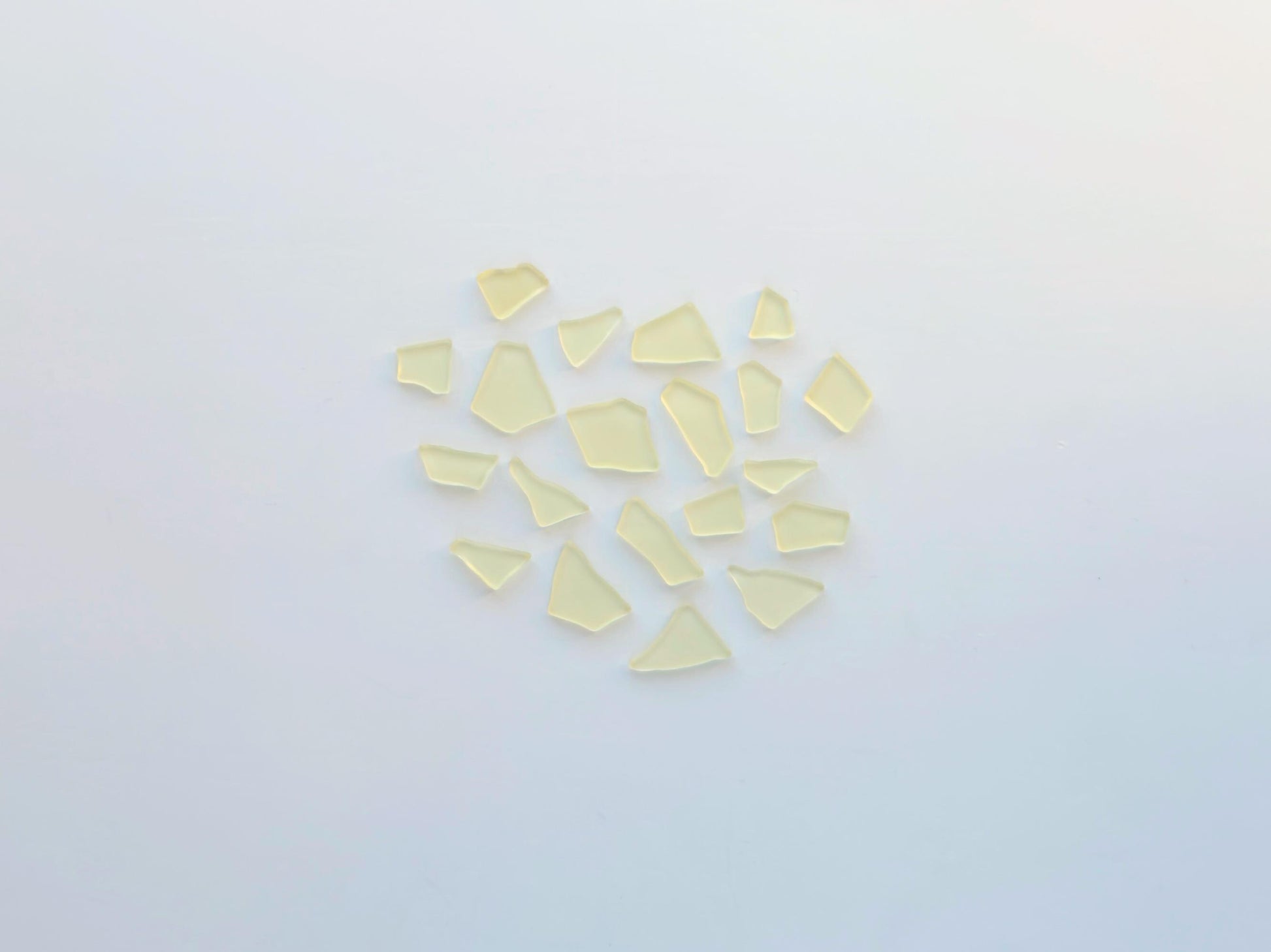 Buttercream yellow tumbled sea glass pieces with smooth frosted edges in small to medium sizes perfect for spring jewelry making mosaics resin art wedding decor and coastal home accents made from recycled vintage glass