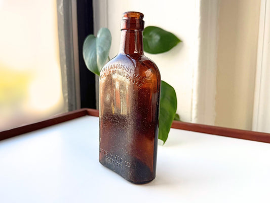 Haig & Haig scotch bottle full front view, amber glass, 1930s-1950s, NYC beach recovery