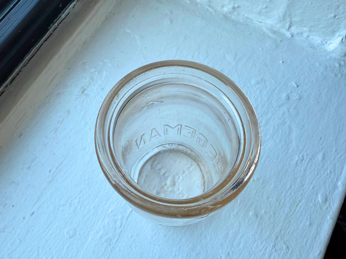Hegeman Hamilton milk bottle top view showing wide mouth opening, 1951 pint clear glass dairy bottle