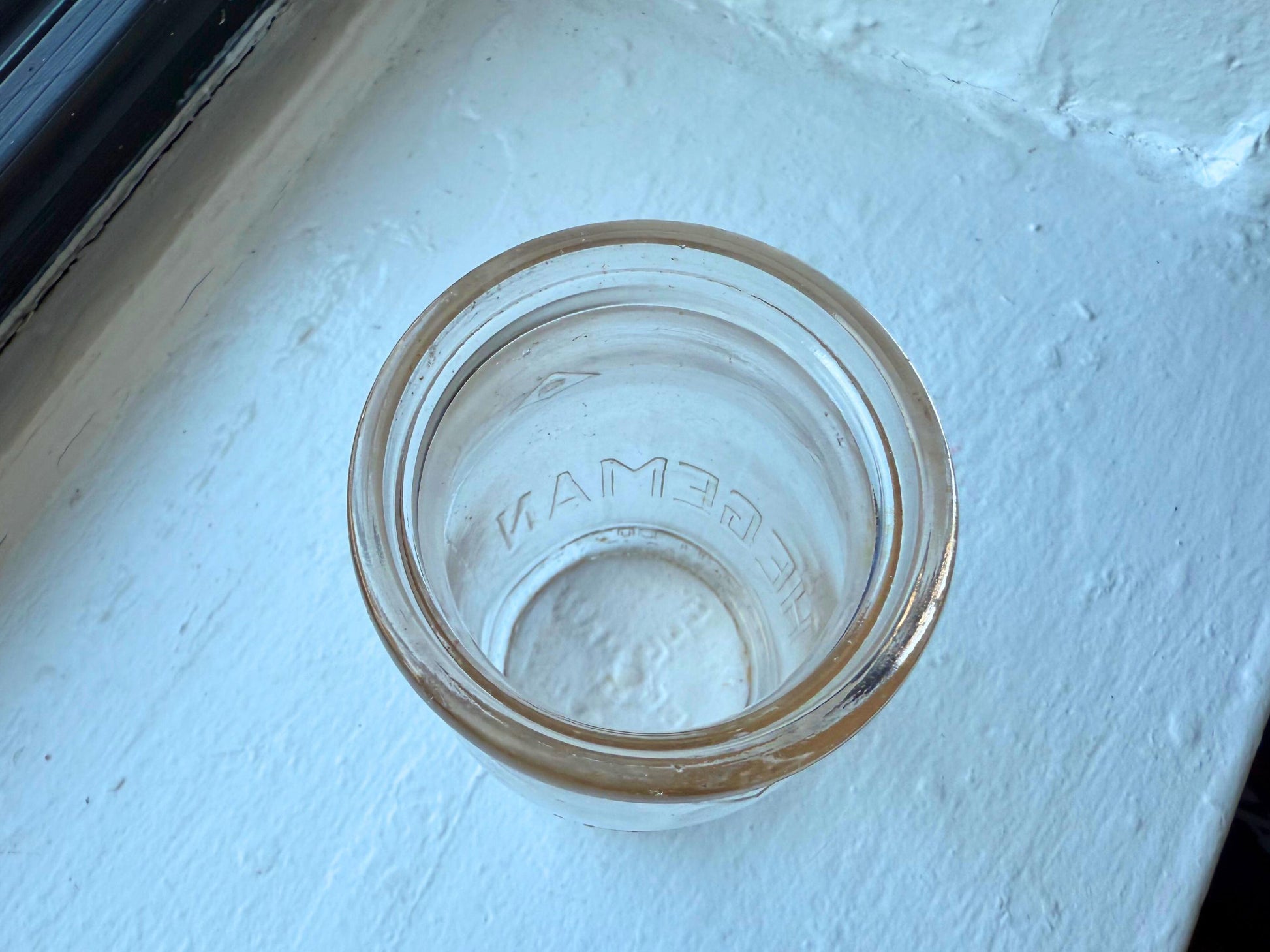 Hegeman Hamilton milk bottle top view showing wide mouth opening, 1951 pint clear glass dairy bottle