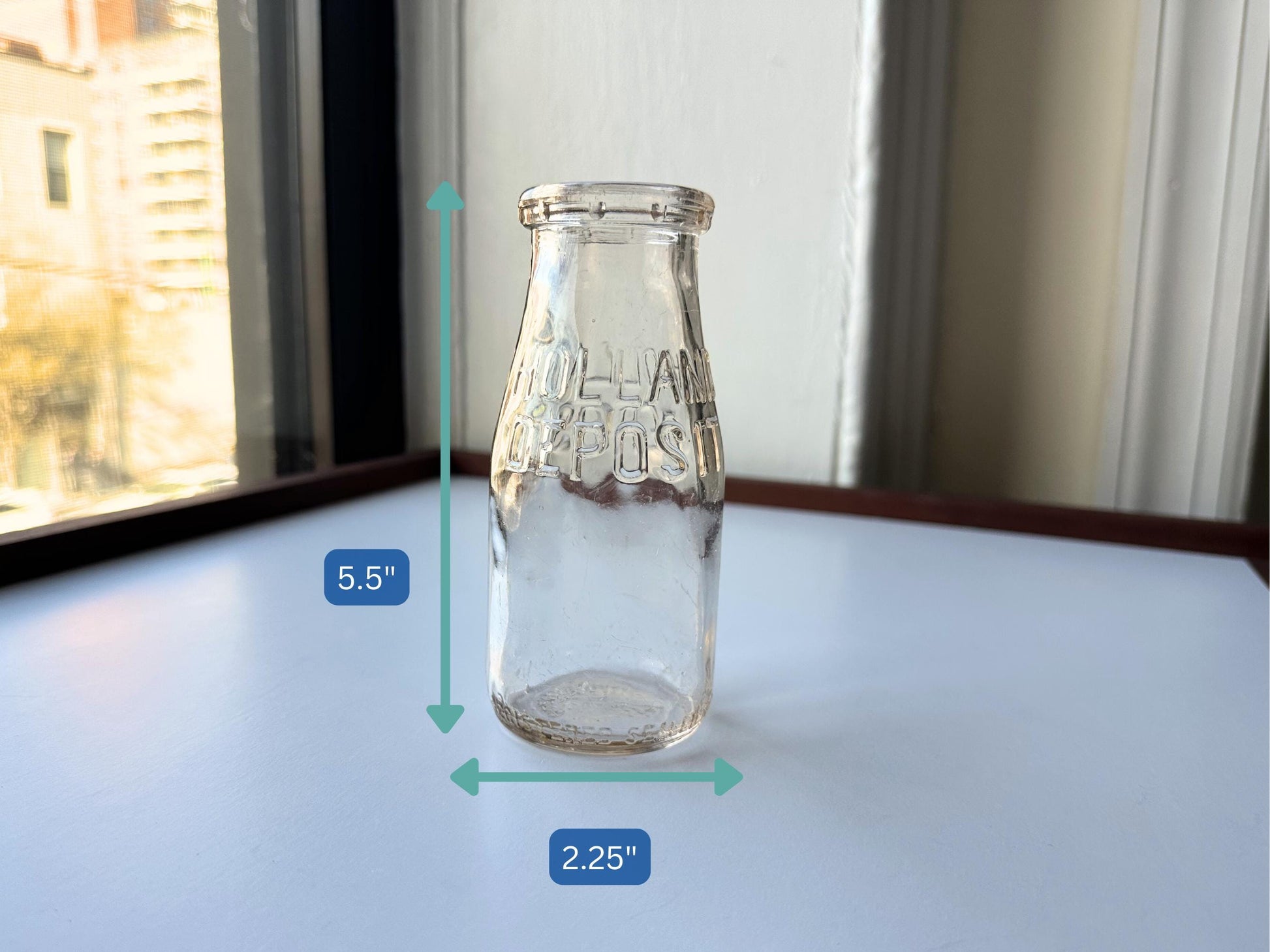 Vintage 1952 clear corktop bottle with distinctive cork-sealed top and production marking. Perfect for vintage kitchen collectors, farmhouse displays, apothecary decor, and cottagecore styling. Good condition clear glass bottle ideal for flowers, storage, or vintage collections.