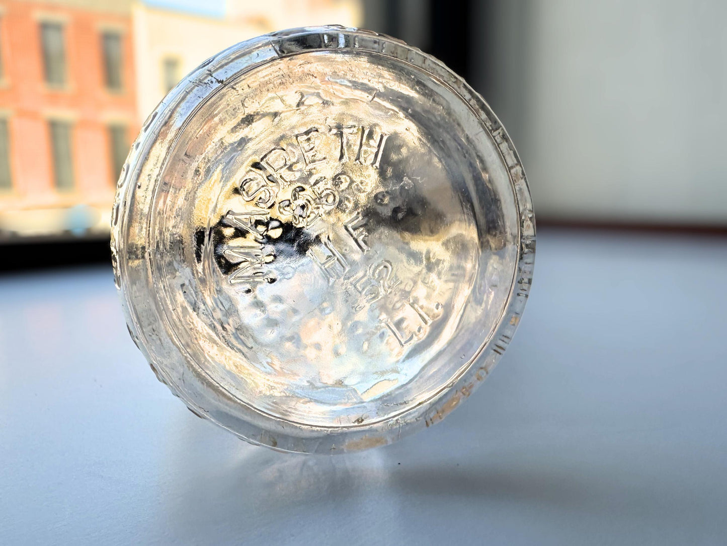 Vintage 1952 clear corktop bottle with distinctive cork-sealed top and production marking. Perfect for vintage kitchen collectors, farmhouse displays, apothecary decor, and cottagecore styling. Good condition clear glass bottle ideal for flowers, storage, or vintage collections.