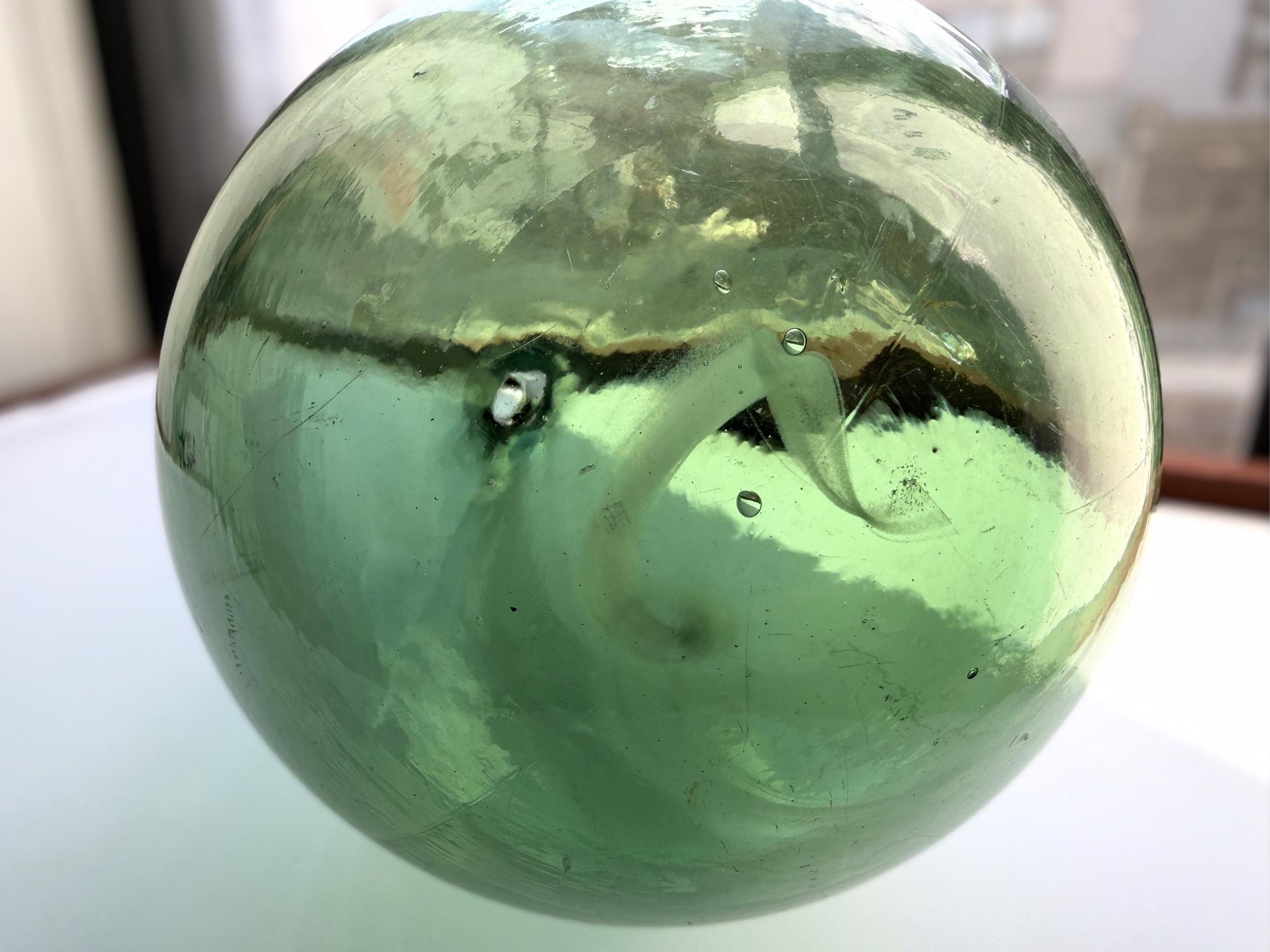 Huge vintage glass green round-bottom wine bottle, 15 inches tall, hand-recovered from NYC mid-century dumping grounds — authentic 1950s or earlier with pontil swirl base mark
