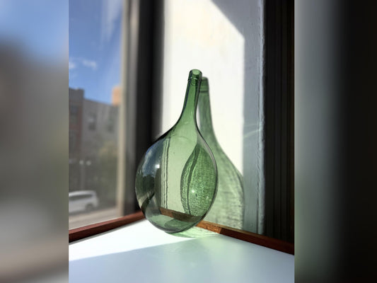 Huge vintage glass green round-bottom wine bottle, 15 inches tall, hand-recovered from NYC mid-century dumping grounds — authentic 1950s or earlier with pontil swirl base mark