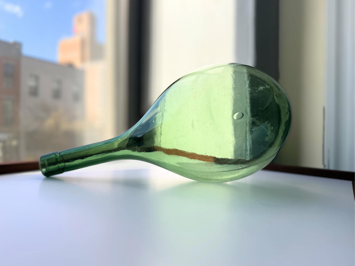 Huge vintage glass green round-bottom wine bottle, 15 inches tall, hand-recovered from NYC mid-century dumping grounds — authentic 1950s or earlier with pontil swirl base mark
