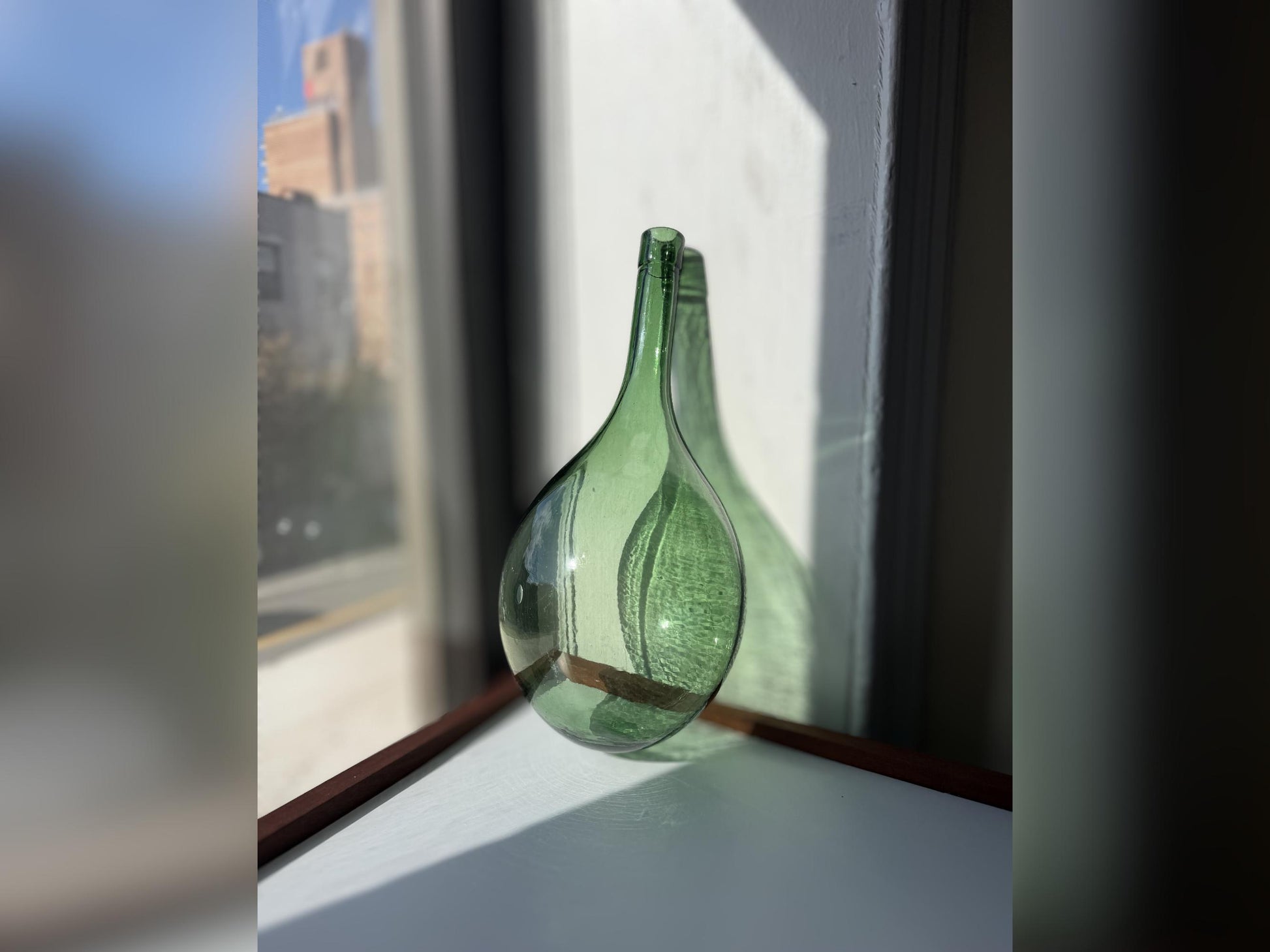 Huge vintage glass green round-bottom wine bottle, 15 inches tall, hand-recovered from NYC mid-century dumping grounds — authentic 1950s or earlier with pontil swirl base mark
