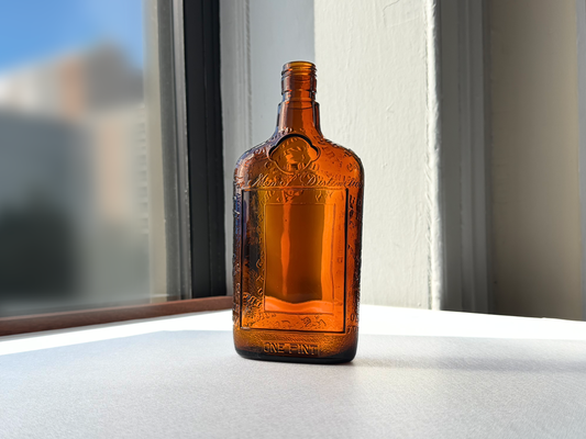 Lord Calvert 1952 amber whiskey flask with dimensions shown, Men of Distinction embossed glass bar collectible