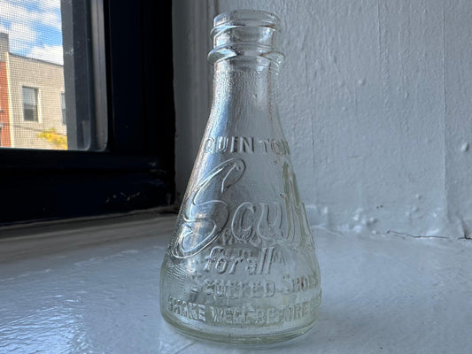 Quintone Scuffy shoe polish bottle, clear glass tapered form, 4.25 inches, NYC beach recovery