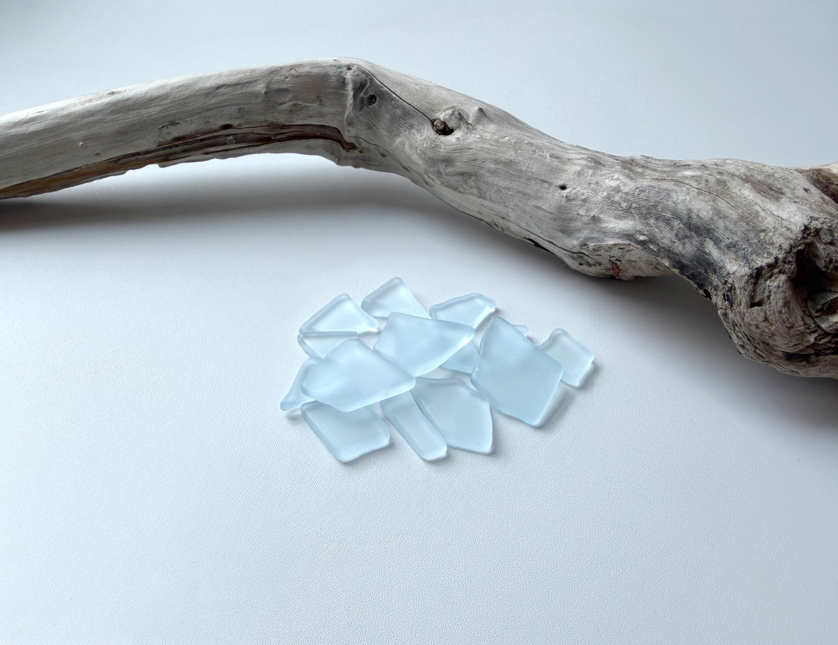 Spring sky blue tumbled sea glass pieces with smooth frosted edges in small to medium sizes perfect for spring jewelry making mosaics resin art coastal decor and nautical home accents made from recycled vintage glass