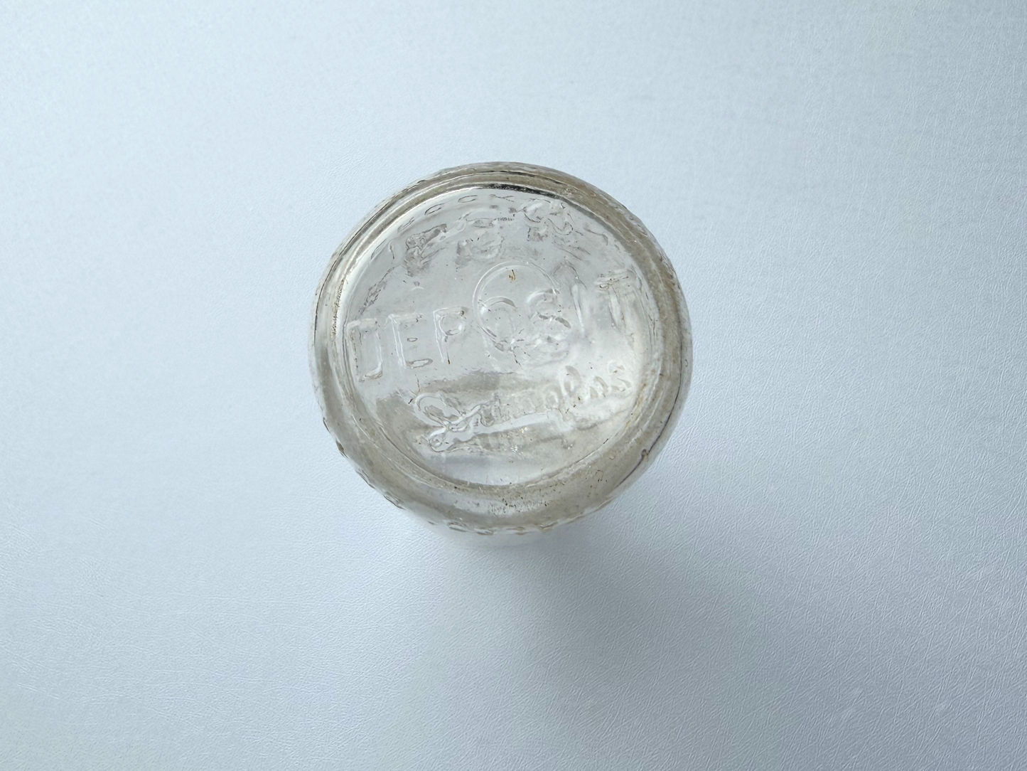 View into the neck opening of a vintage Grandview Dairy milk bottle, showing the clear glass interior and confirming it is empty and intended for decorative use only.